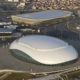 An aerial view from a helicopter shows the Olympic Park under construction in the Adler district of the Black Sea resort city of Sochi, December 23, 2013. Sochi will host the 2014 Winter Olympic Games in February. The view shows (clockwise from bottom) the "Bolshoy" Ice Dome, the "Ice Cube" Curling center and the "Adler Arena". Picture taken December 23, 2013. REUTERS/Maxim Shemetov (RUSSIA  - Tags: CITYSCAPE BUSINESS CONSTRUCTION SPORT OLYMPICS) ORG XMIT: SOC10